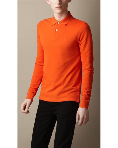 orange burberry longsleeve polo